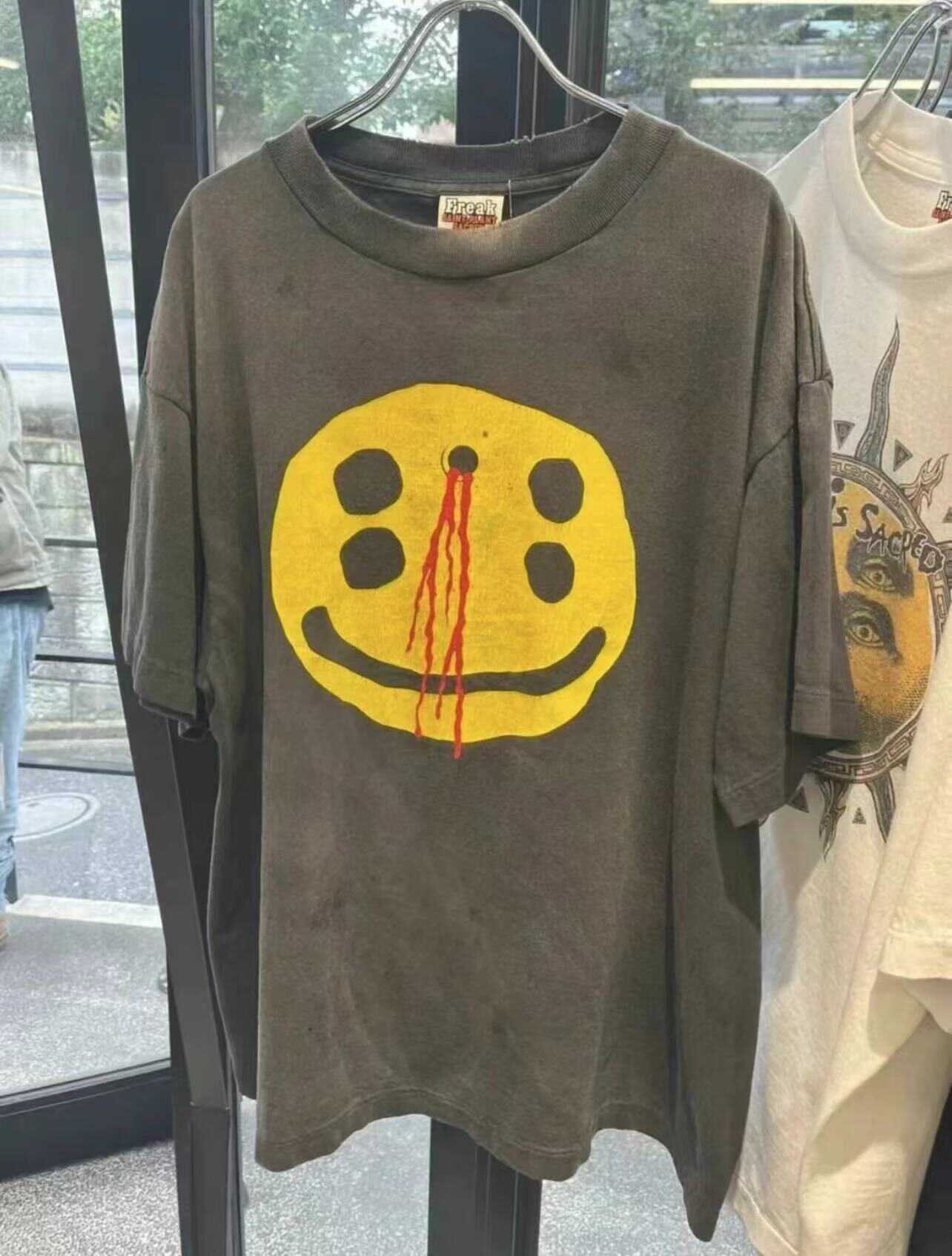 saint michael & cpfm co-branded smiley F**e