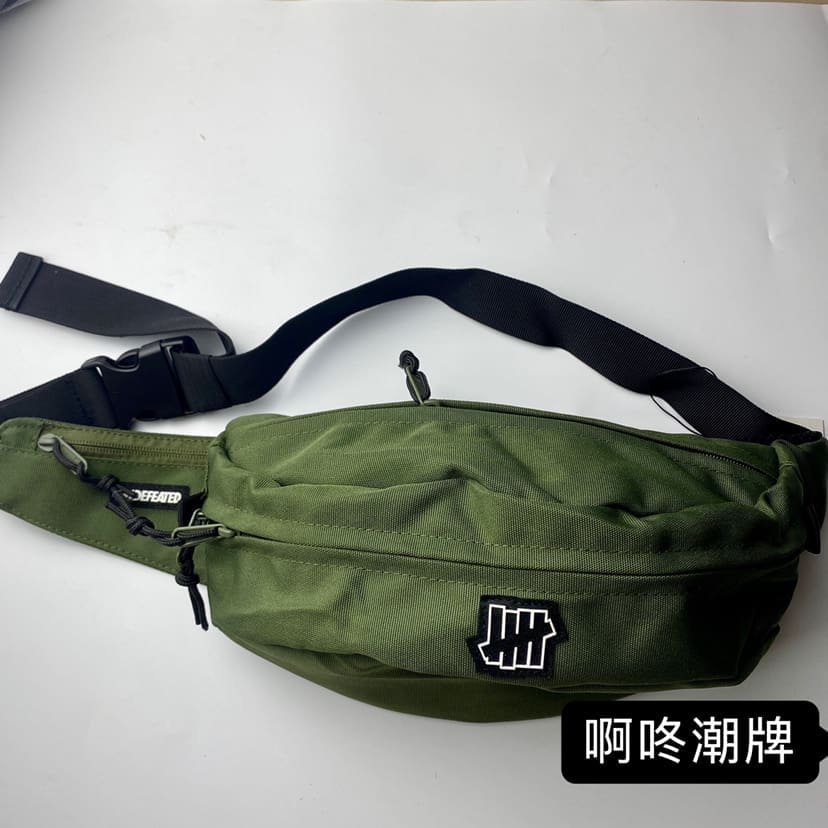 Undefeated Five-Stroke Armband Crossbody Bag